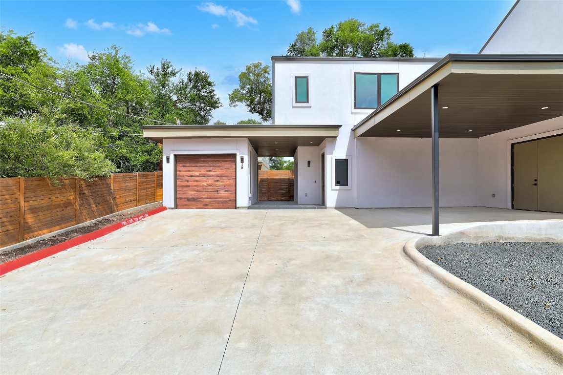 3208 Clawson Road, Unit 5B Austin, TX 78704 - Photo 1 of 1 Contemporary house featuring concrete driveway and stucco siding