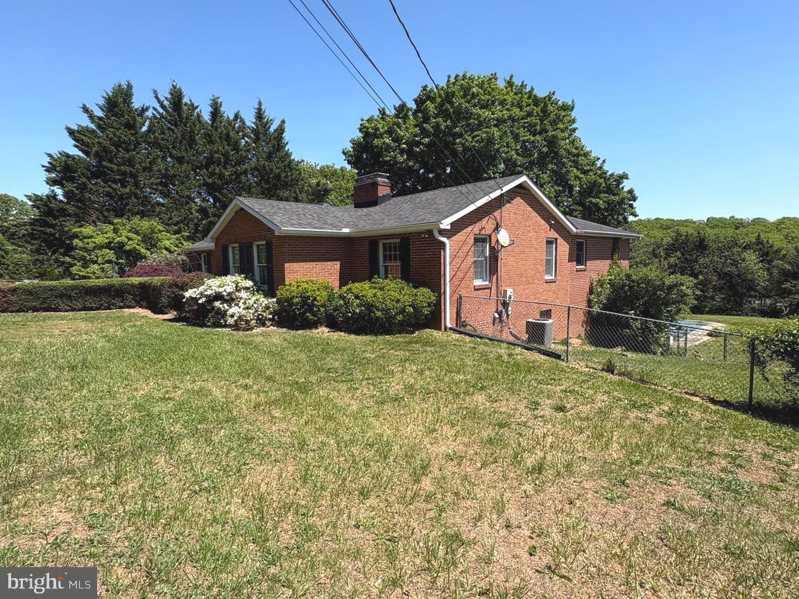 4215 Buffalo Road Mount Airy, MD 21771 - Photo 39 of 44 a front view of a house with a yard
