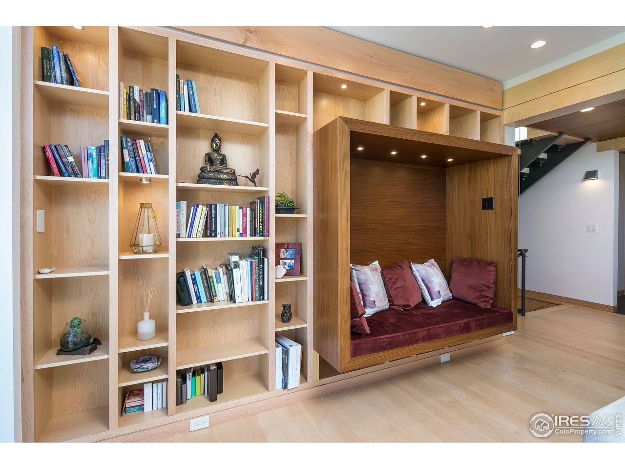 2235 Vassar Drive Boulder, CO 80305 - Photo 13 of 40 a view of living room with furniture and book shelf