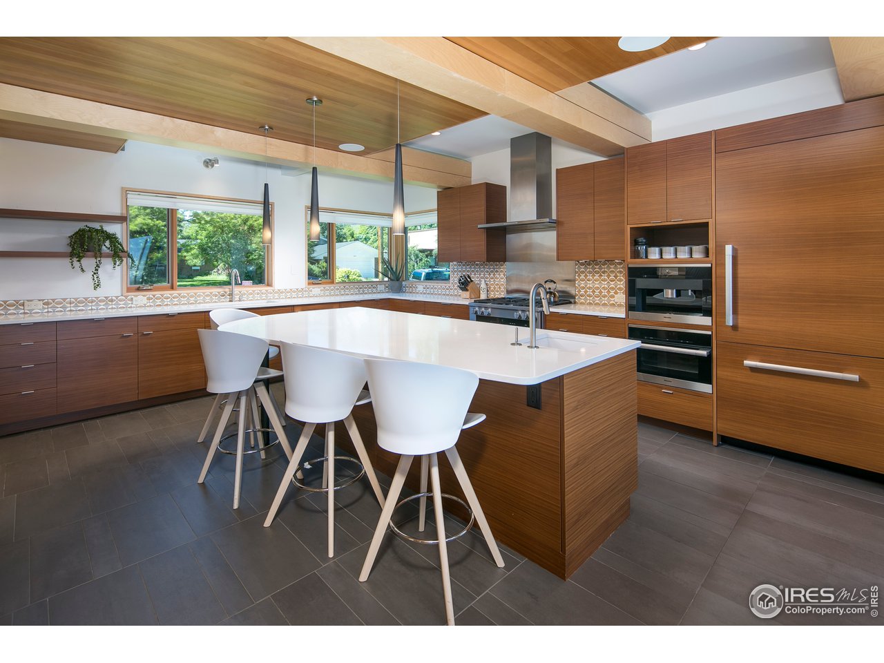 2235 Vassar Drive Boulder, CO 80305 - Photo 14 of 40 a kitchen with a sink cabinets and window