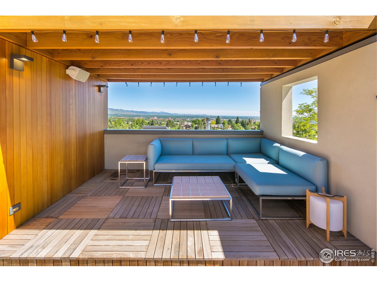 2235 Vassar Drive Boulder, CO 80305 - Photo 30 of 40 a picture of a table and chairs in patio