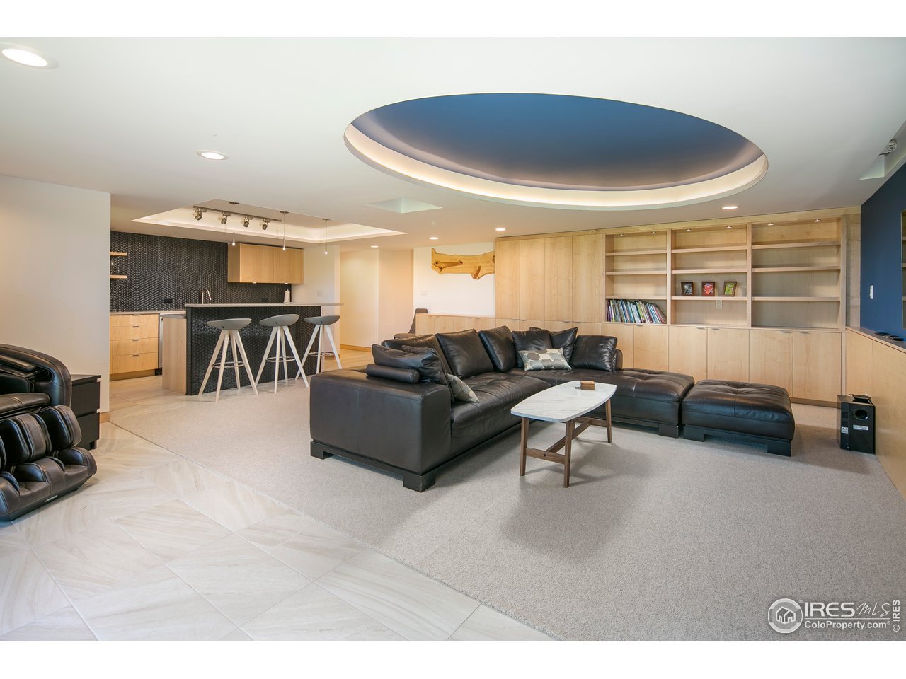 2235 Vassar Drive Boulder, CO 80305 - Photo 31 of 40 a living room with furniture and a flat screen tv