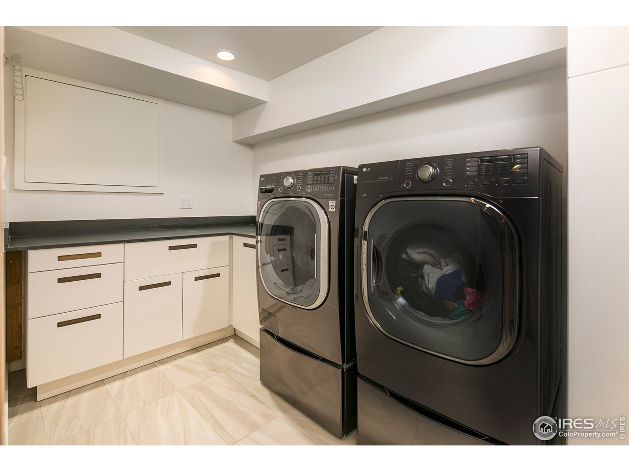 2235 Vassar Drive Boulder, CO 80305 - Photo 36 of 40 a utility room with dryer and washer