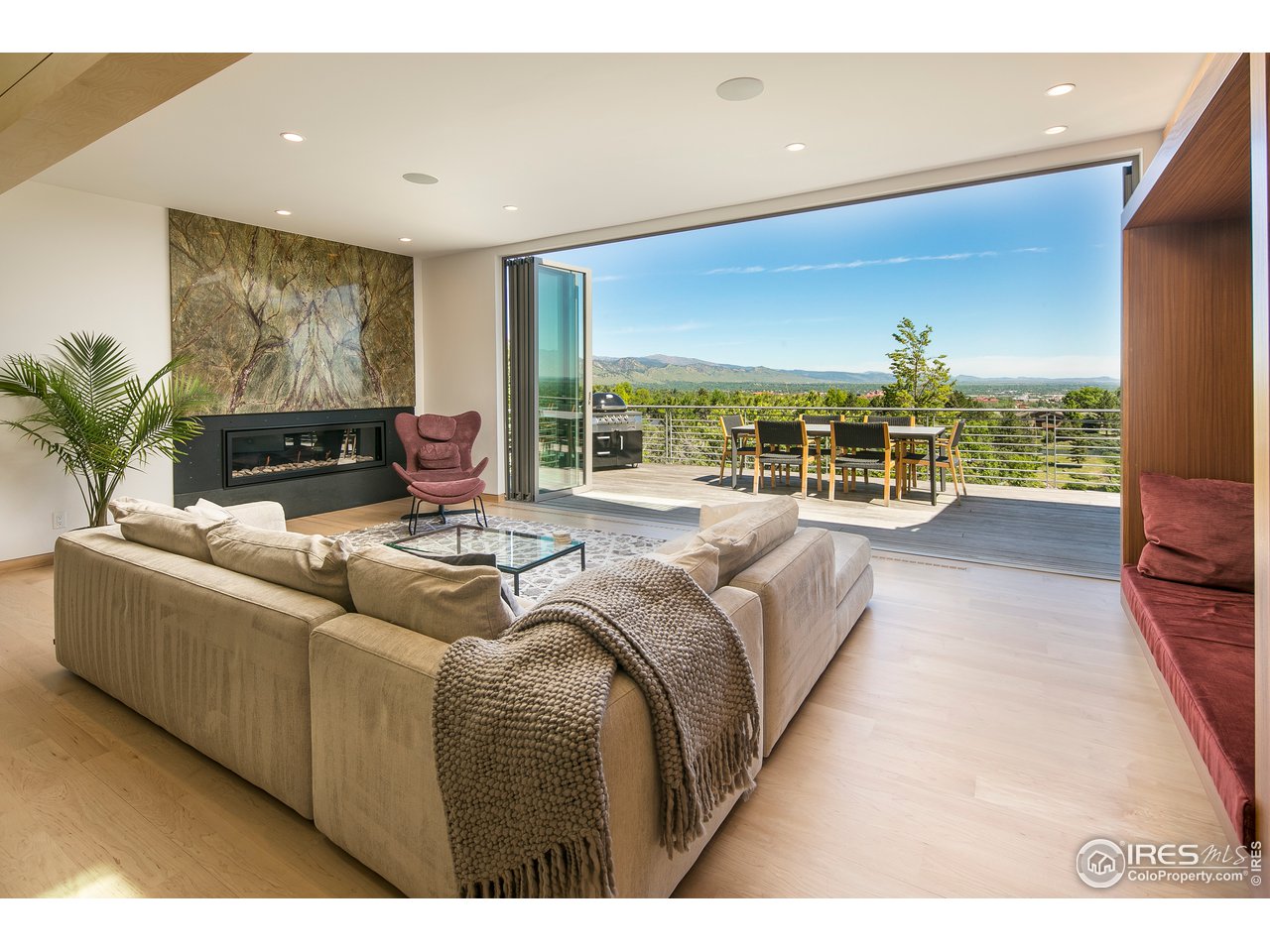 2235 Vassar Drive Boulder, CO 80305 - Photo 7 of 40 a living room with furniture and a flat screen tv