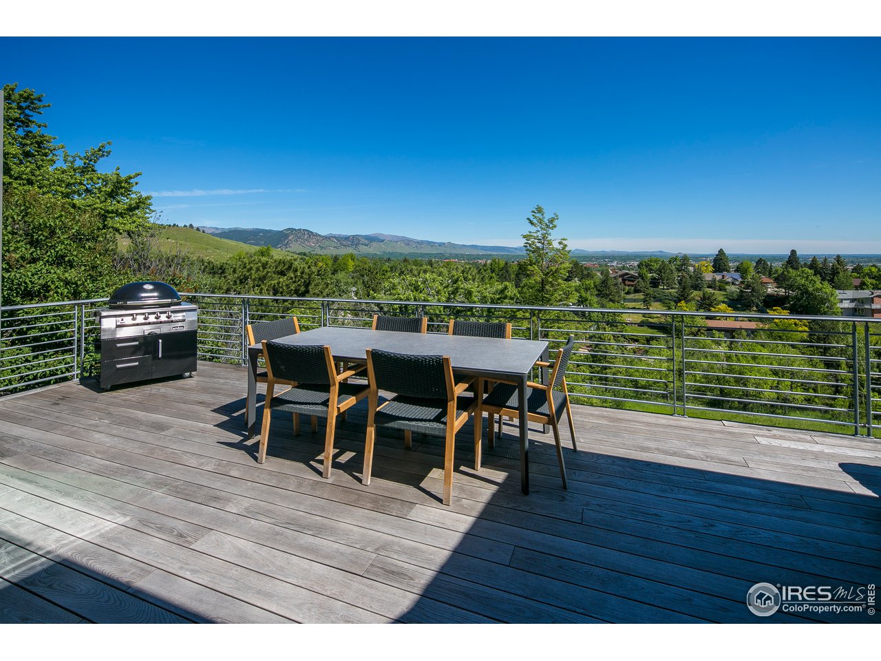 2235 Vassar Drive Boulder, CO 80305 - Photo 10 of 40 a view of a terrace with furniture and a table