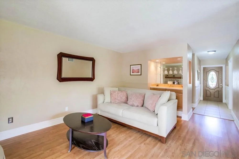 14655 Evening Star Drive Poway, CA 92064 - Photo 13 of 33 a living room with furniture and wooden floor