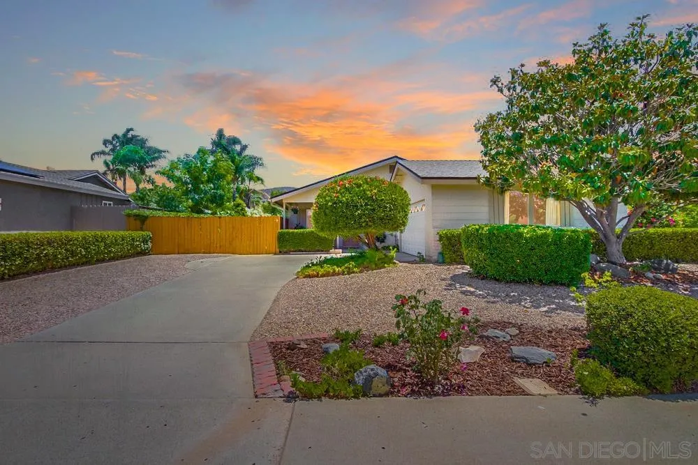 14655 Evening Star Drive Poway, CA 92064 - Photo 2 of 33 a front view of a house with a yard and garage
