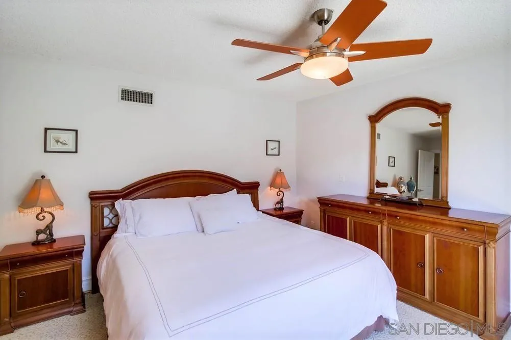 14655 Evening Star Drive Poway, CA 92064 - Photo 21 of 33 a bedroom with a bed and a desk