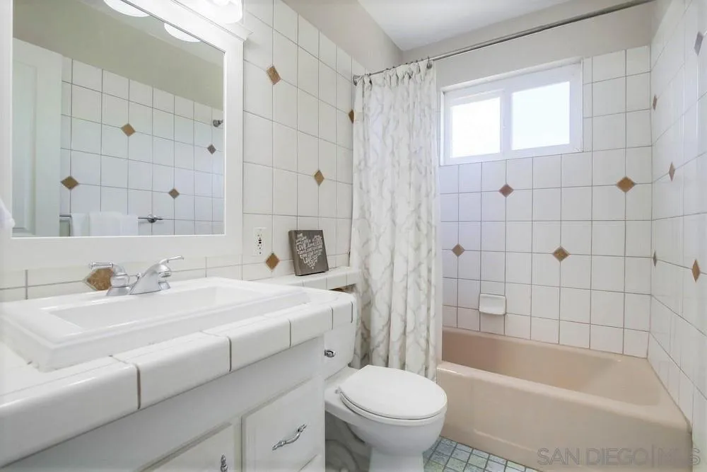 14655 Evening Star Drive Poway, CA 92064 - Photo 27 of 33 a bathroom with a sink toilet vanity and shower