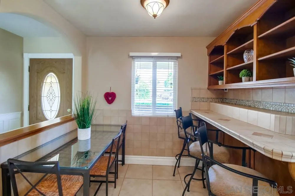 14655 Evening Star Drive Poway, CA 92064 - Photo 7 of 33 a dining room with furniture and window