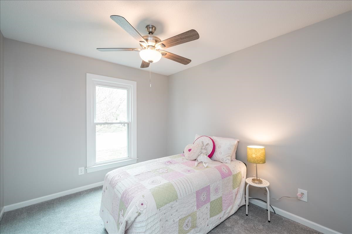 10836 Fanny Brown Road Raleigh, NC 27603 - Photo 12 of 18 new paint & carpet with a view of the crepe myrtle tree out front bedroom 3