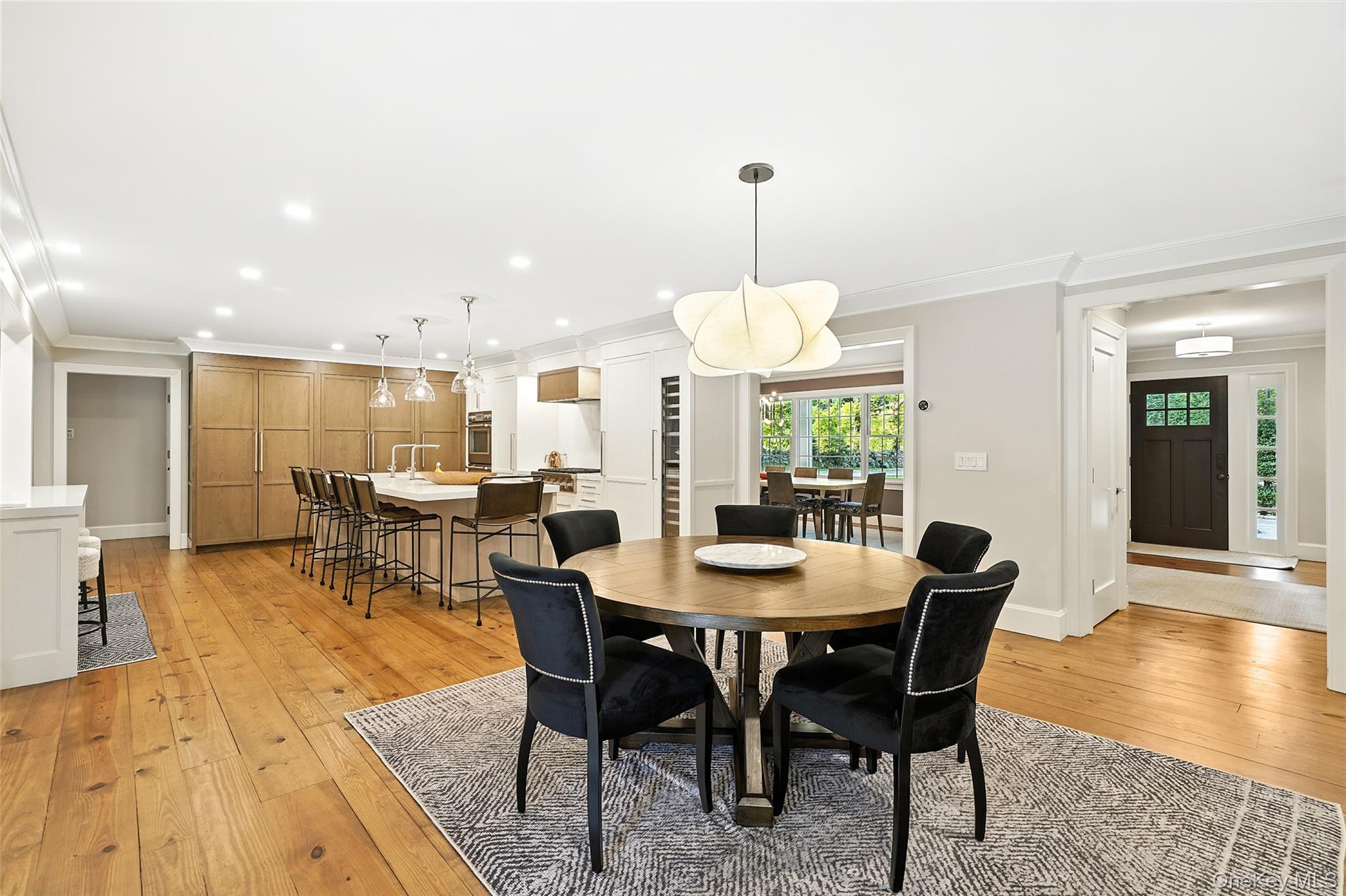 548 Anderson Hill Road Purchase, NY 10577 - Photo 13 of 46 a view of a dining room with furniture