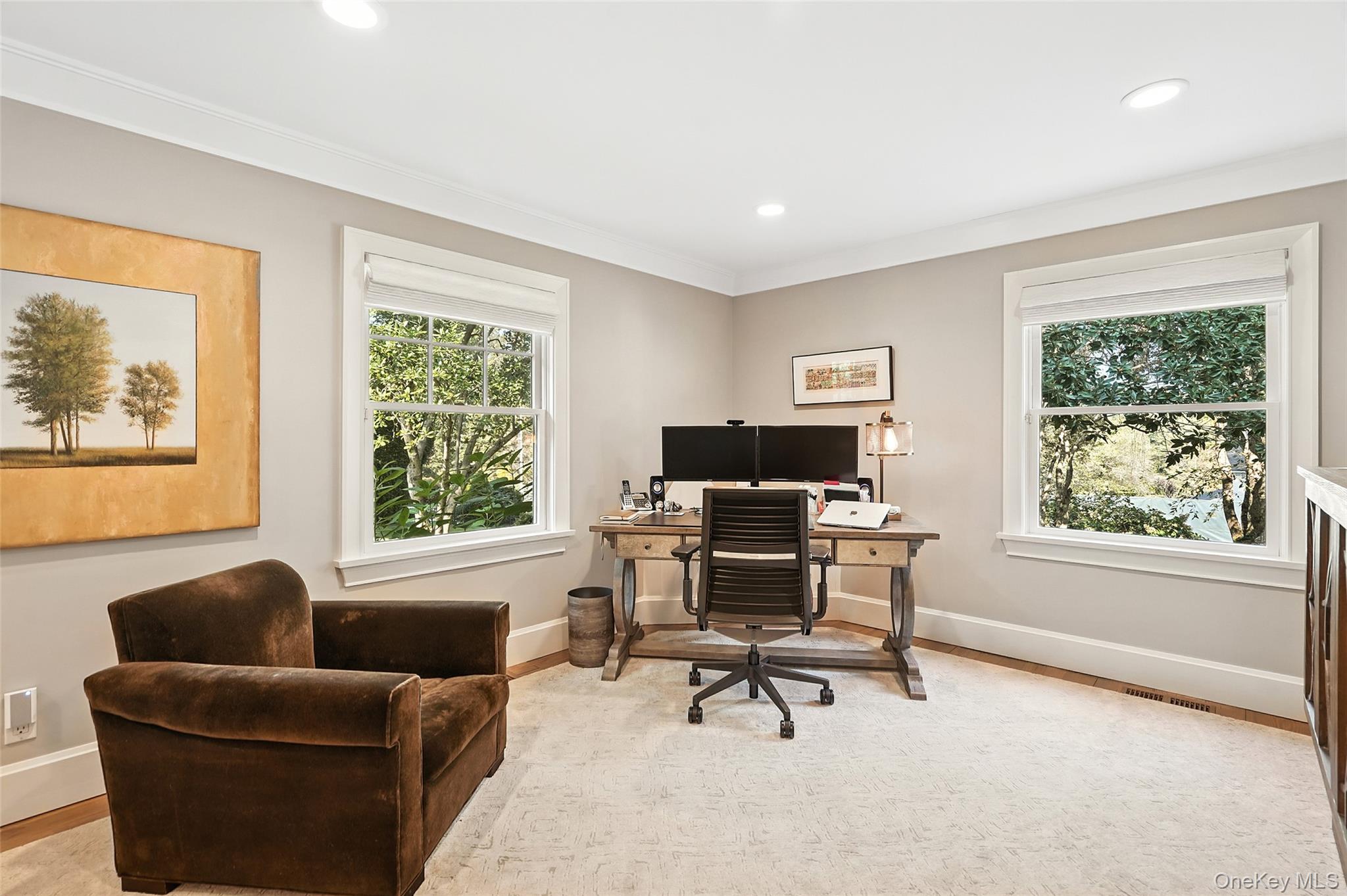 548 Anderson Hill Road Purchase, NY 10577 - Photo 19 of 46 a living room with furniture and a window