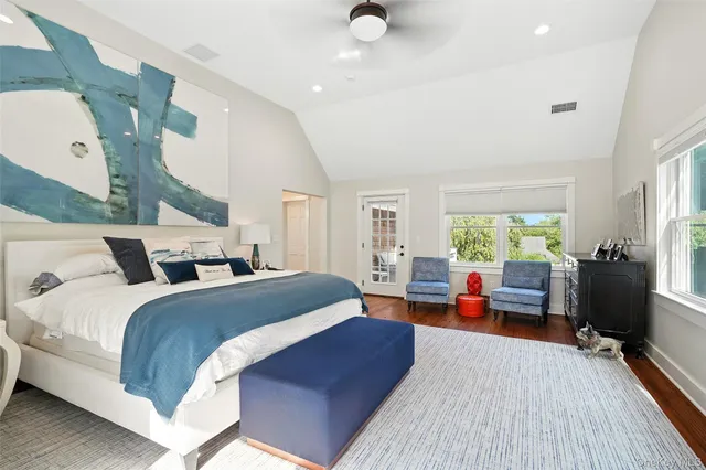 a bed room with a bed and furniture