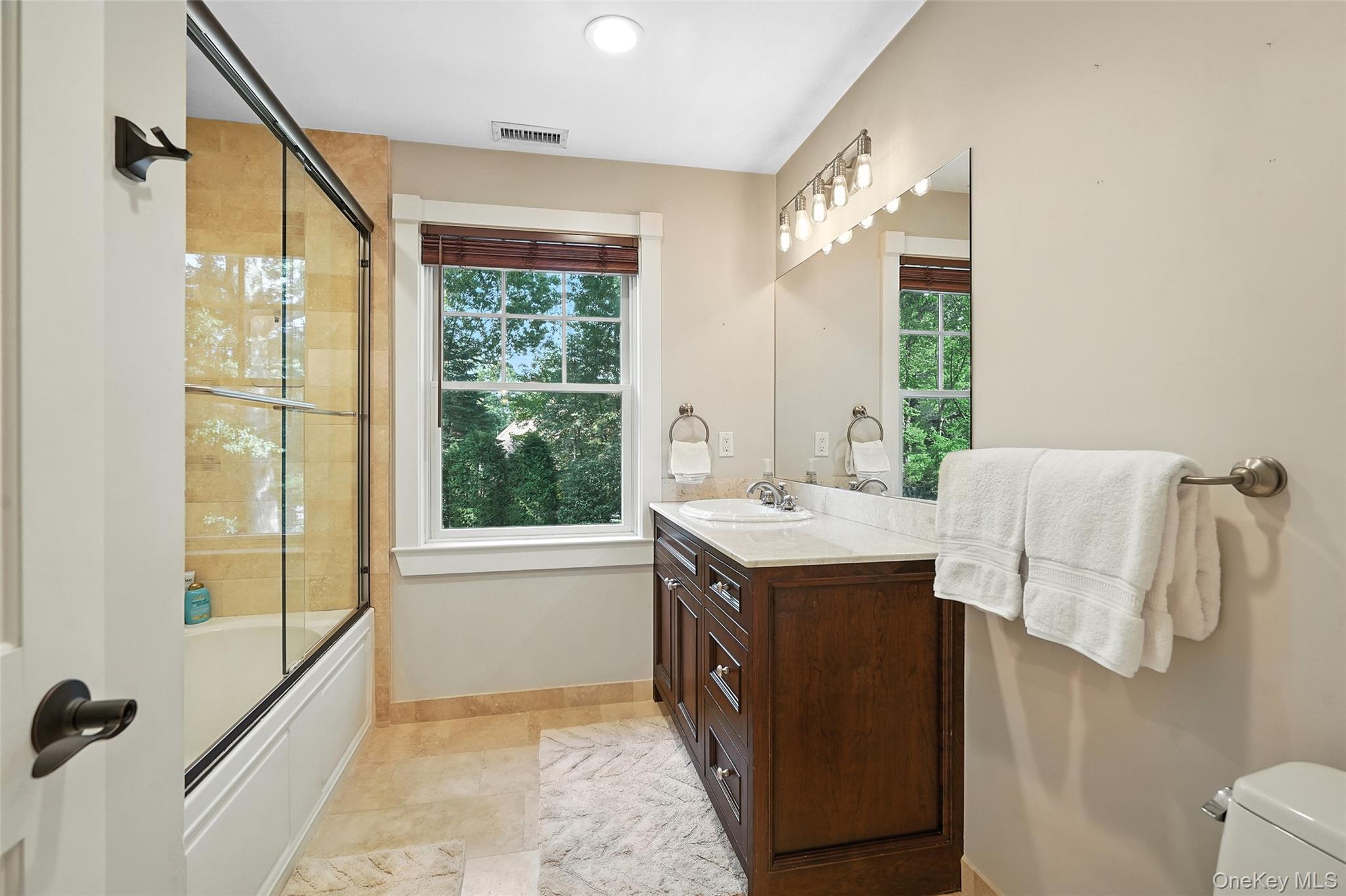 548 Anderson Hill Road Purchase, NY 10577 - Photo 29 of 46 a kitchen with a sink and a refrigerator
