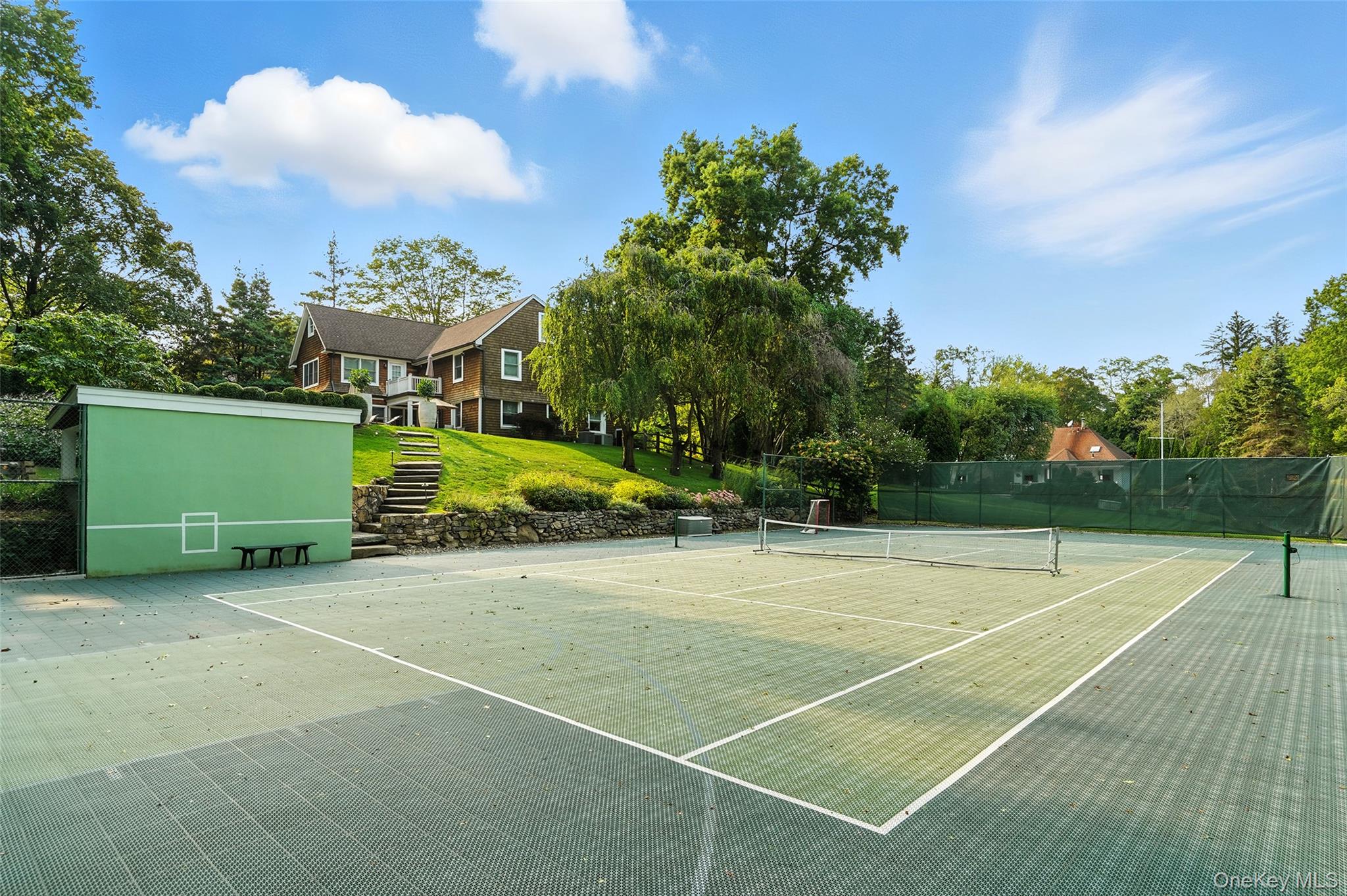548 Anderson Hill Road Purchase, NY 10577 - Photo 39 of 46 a view of an outdoor space and tennis court