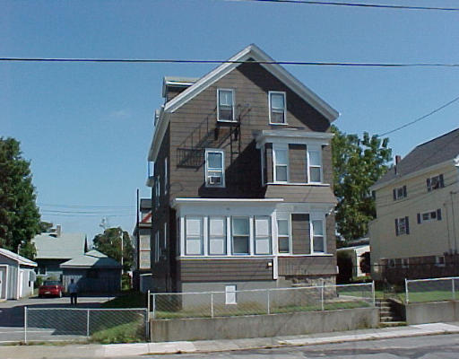 46 Lane Fall River Fall River, MA 02721 - Photo 1 of 1 a front view of a house with garden