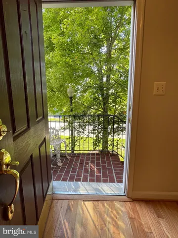 a view of swimming pool from a balcony