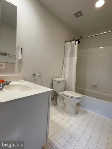 a sign on the side of a street