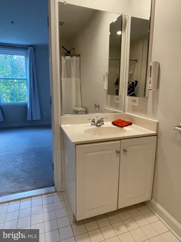 a view of a big building next to a road