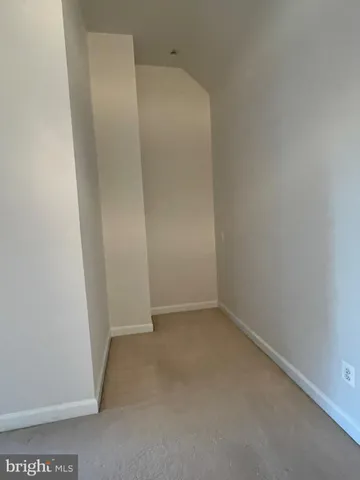 a view of a building and car parked