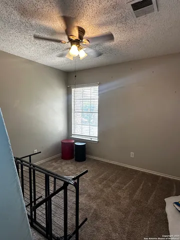 a workspace with furniture and window