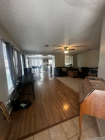 a room with gym equipment and a large window