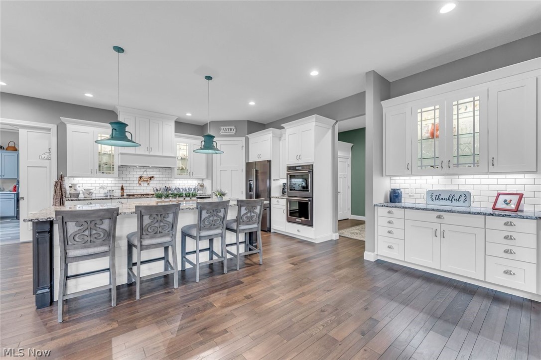 41264 Ravines Edge Way Lagrange, OH 44050 - Photo 18 of 43 Huge kitchen Island with granite counter.