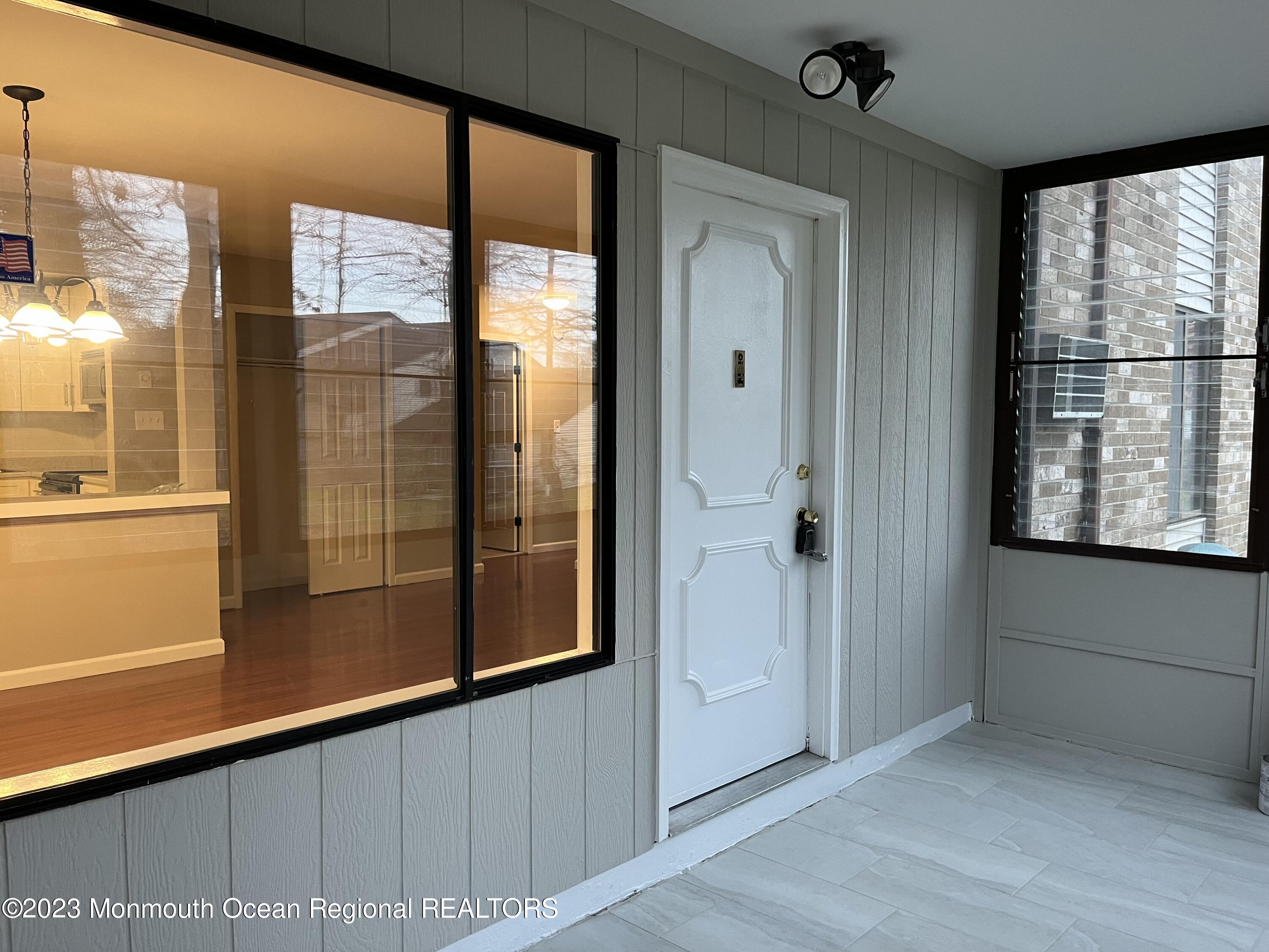 136 Amberly Drive, Unit F Manalapan, NJ 07726 - Photo 1 of 14 a view of front door