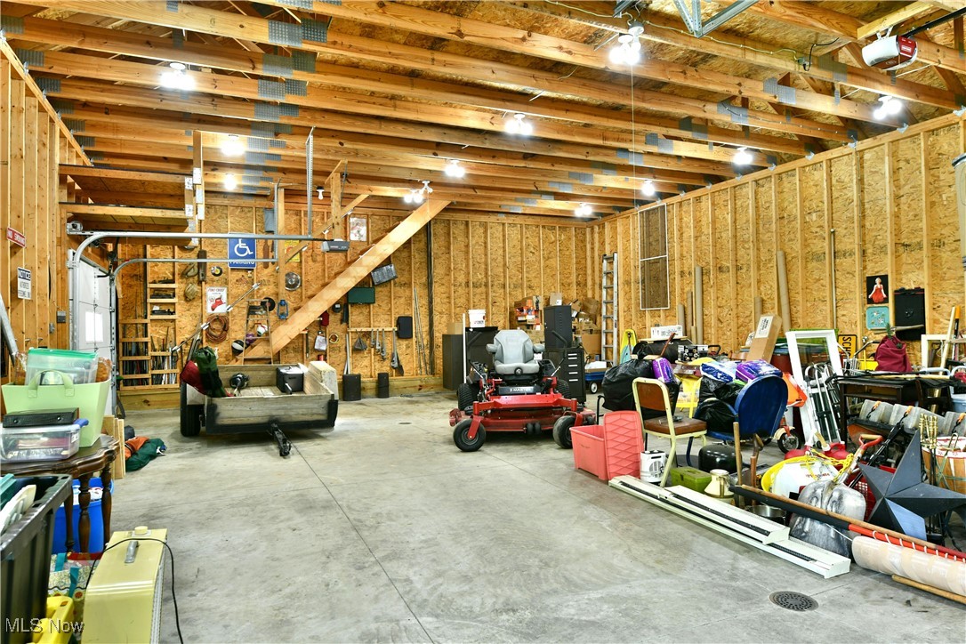 379 Housel Craft Road Bristolville, OH 44402 - Photo 45 of 50 Garage featuring a garage door opener