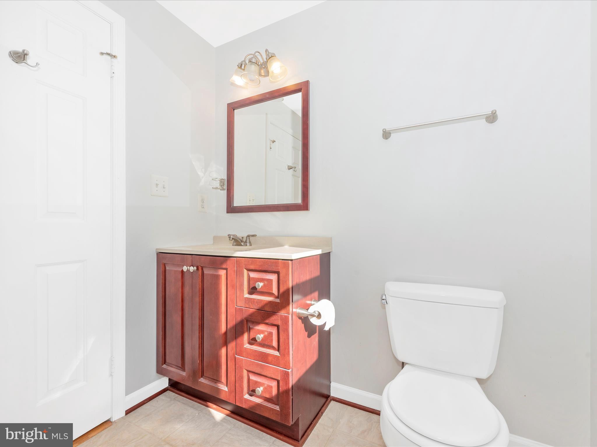 5169 Perry Road Mount Airy, MD 21771 - Photo 28 of 60 a bathroom with a toilet and a sink