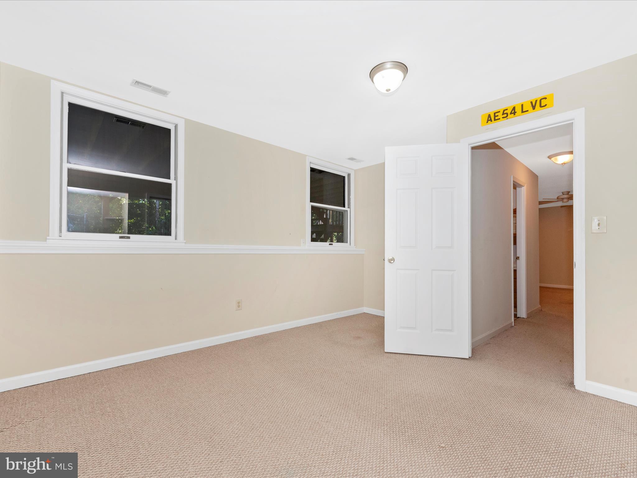 5169 Perry Road Mount Airy, MD 21771 - Photo 36 of 60 an empty room with a bathroom and a window