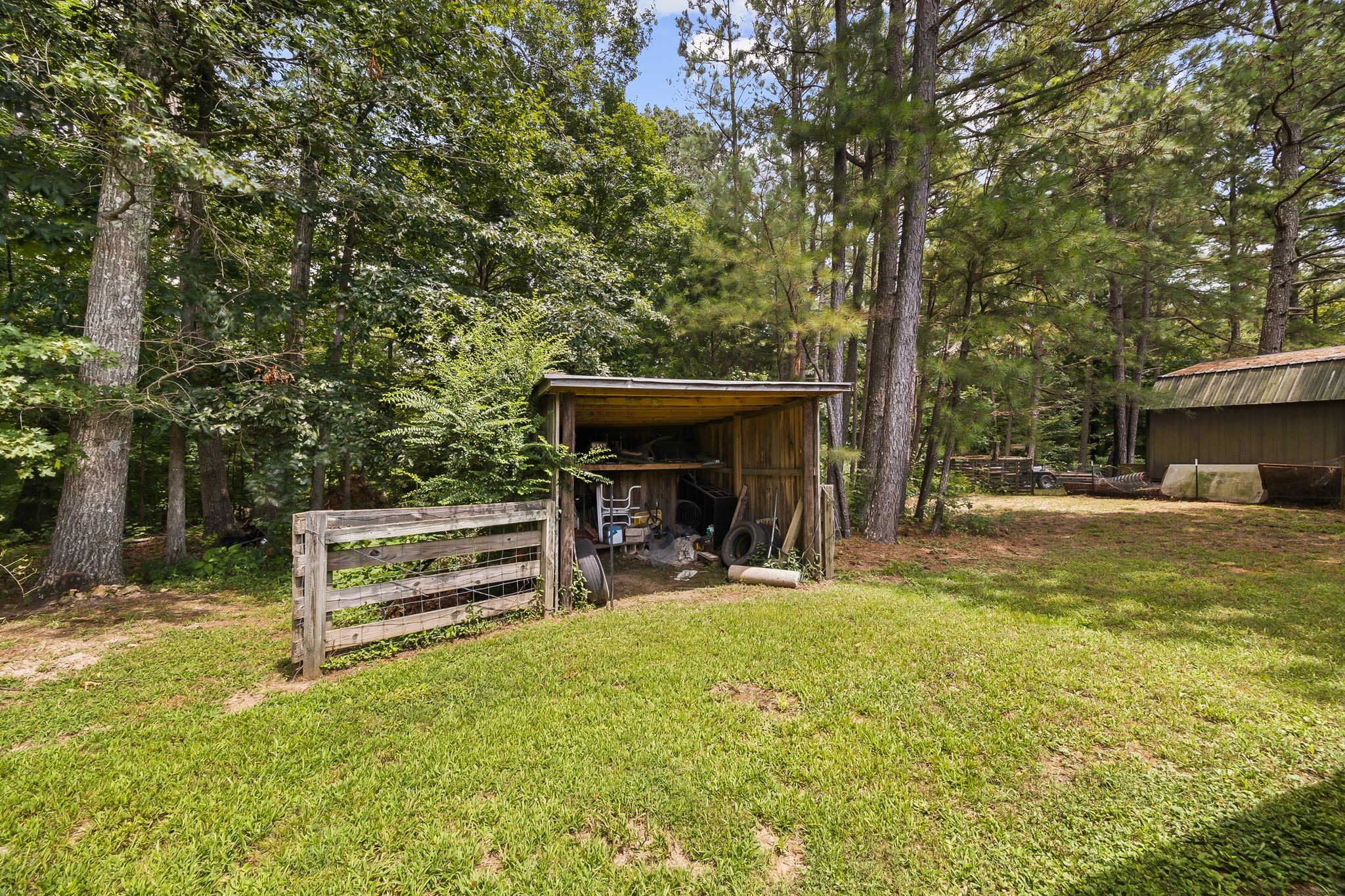 6455 Primm Springs Road Lyles, TN 37098 - Photo 29 of 30 a view of a house with backyard and sitting area