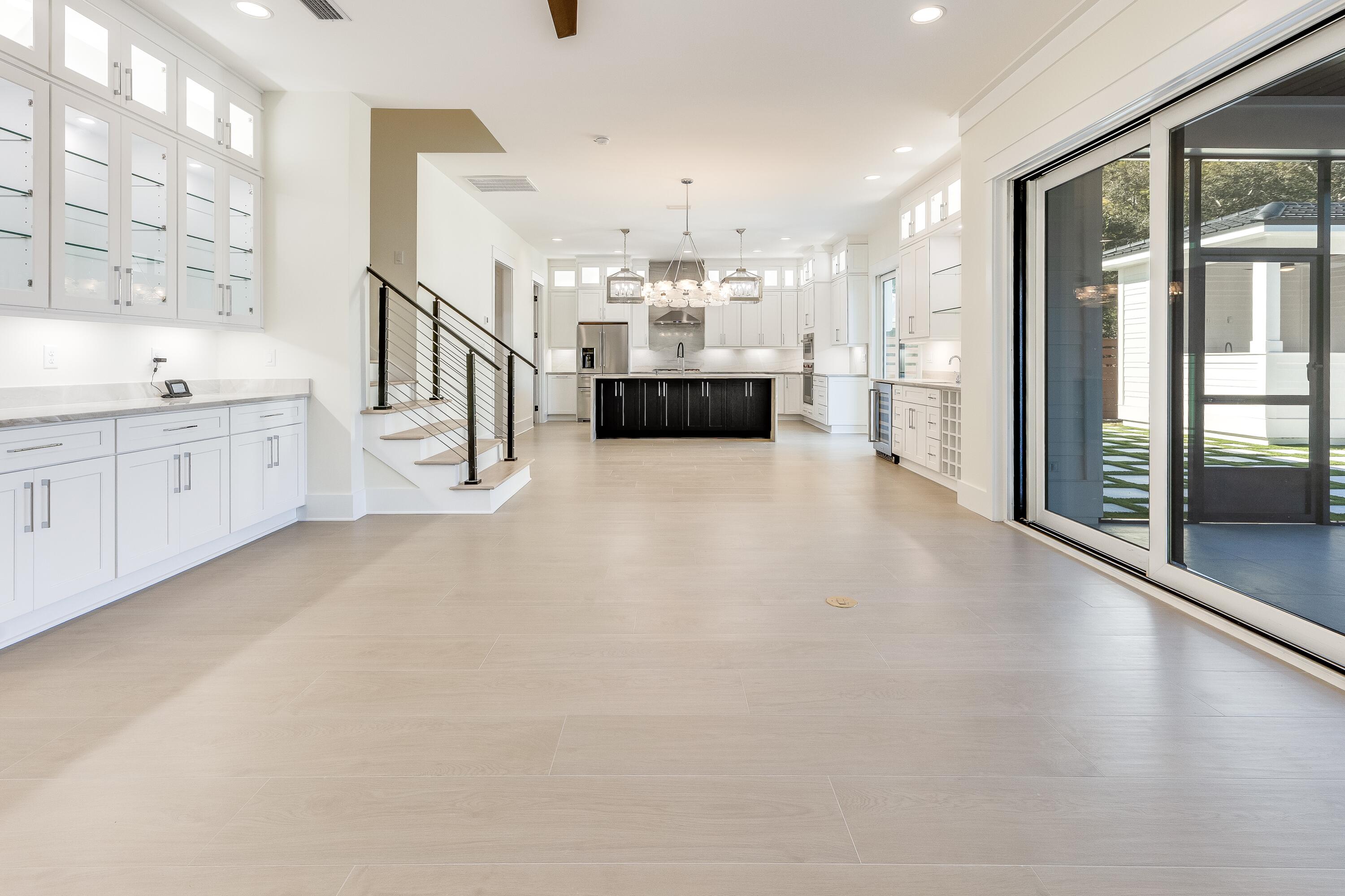 63 Maple Street Santa Rosa Beach, FL 32459 - Photo 13 of 88 a large white kitchen with a large window