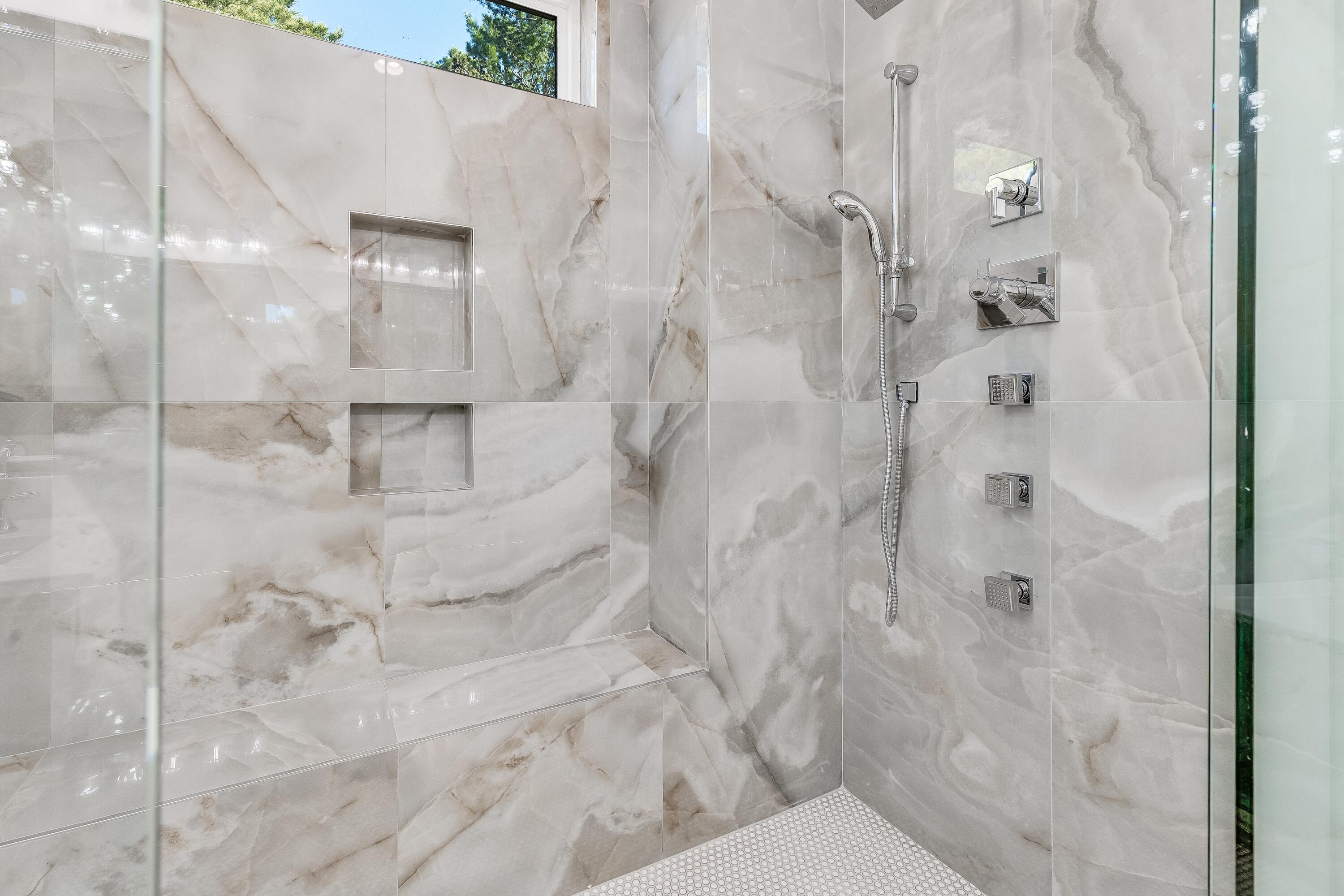 63 Maple Street Santa Rosa Beach, FL 32459 - Photo 35 of 88 a bathroom with a shower