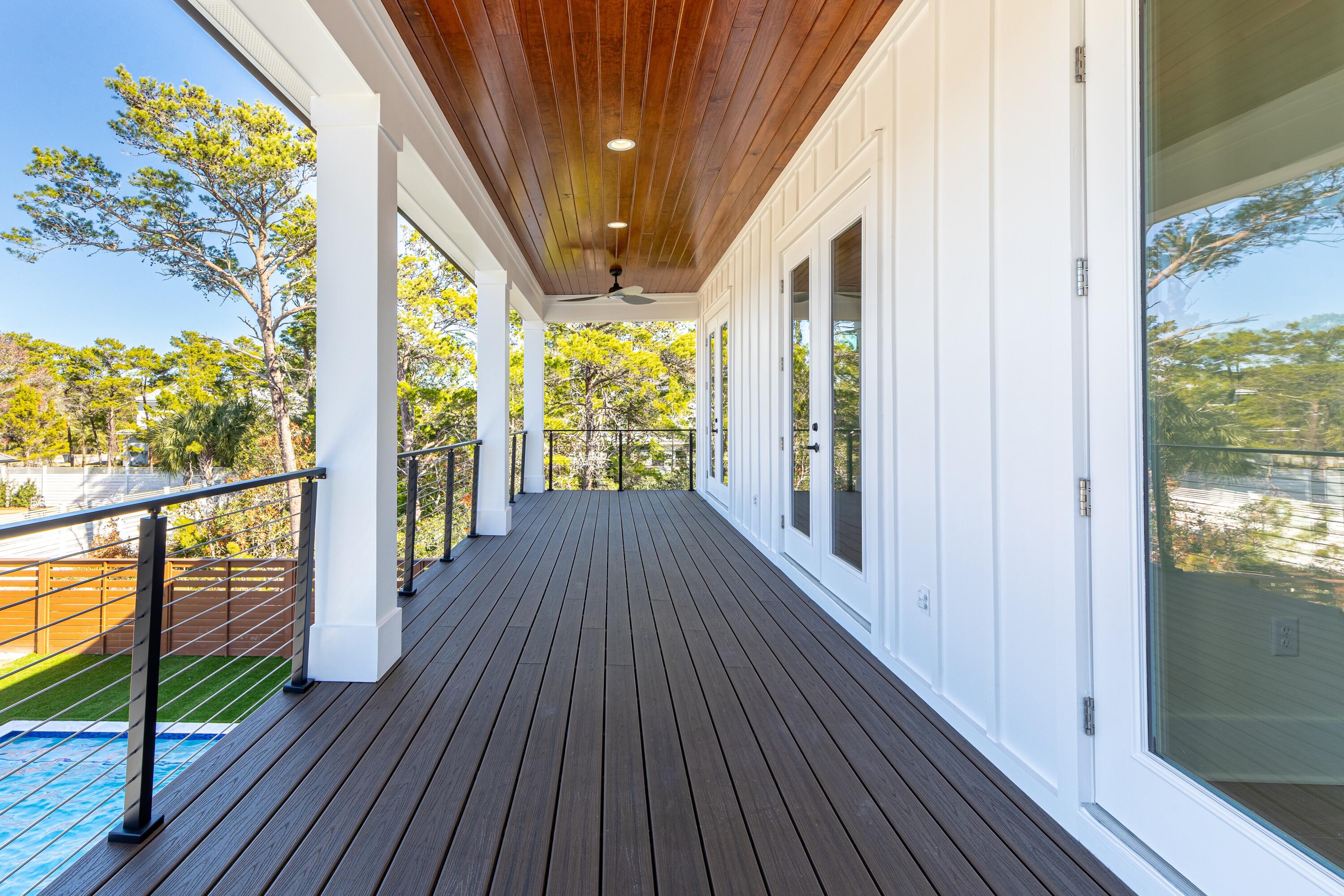 63 Maple Street Santa Rosa Beach, FL 32459 - Photo 48 of 88 a view of balcony with wooden floor