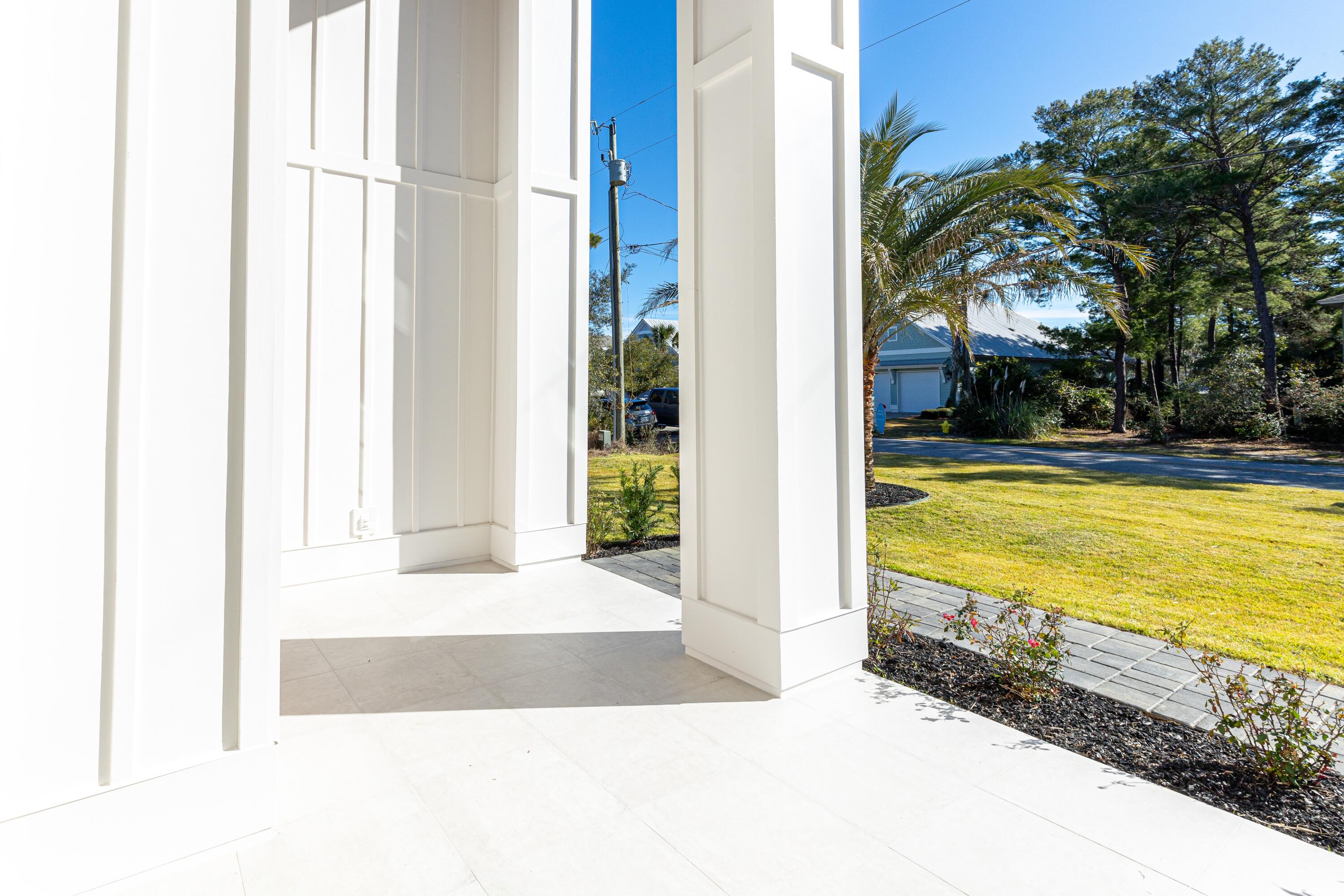 63 Maple Street Santa Rosa Beach, FL 32459 - Photo 5 of 88 a view of a living room and floor to ceiling window