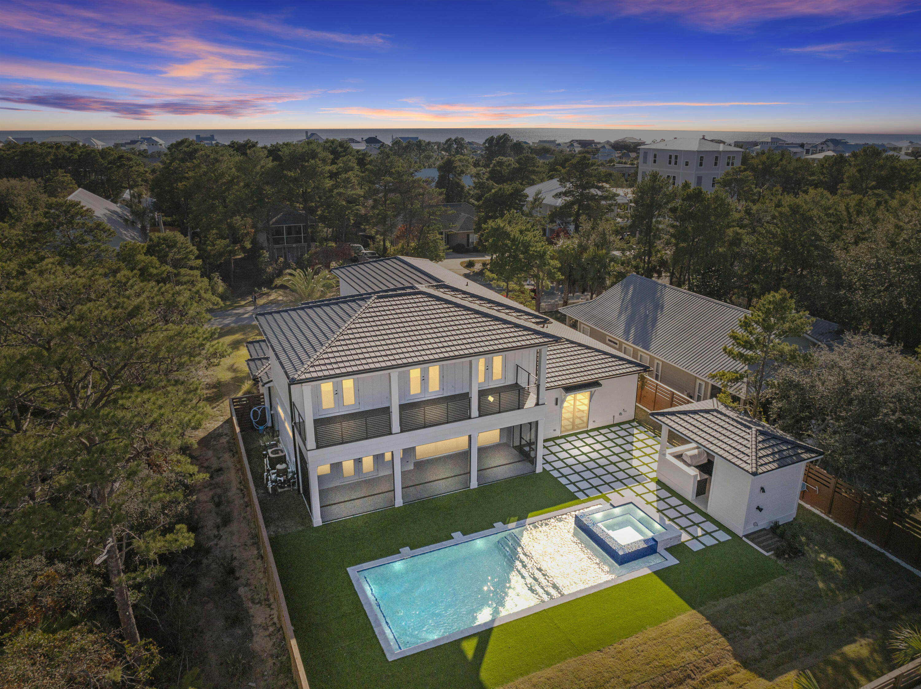 63 Maple Street Santa Rosa Beach, FL 32459 - Photo 74 of 88 a view of a big house with a big yard plants and large tree