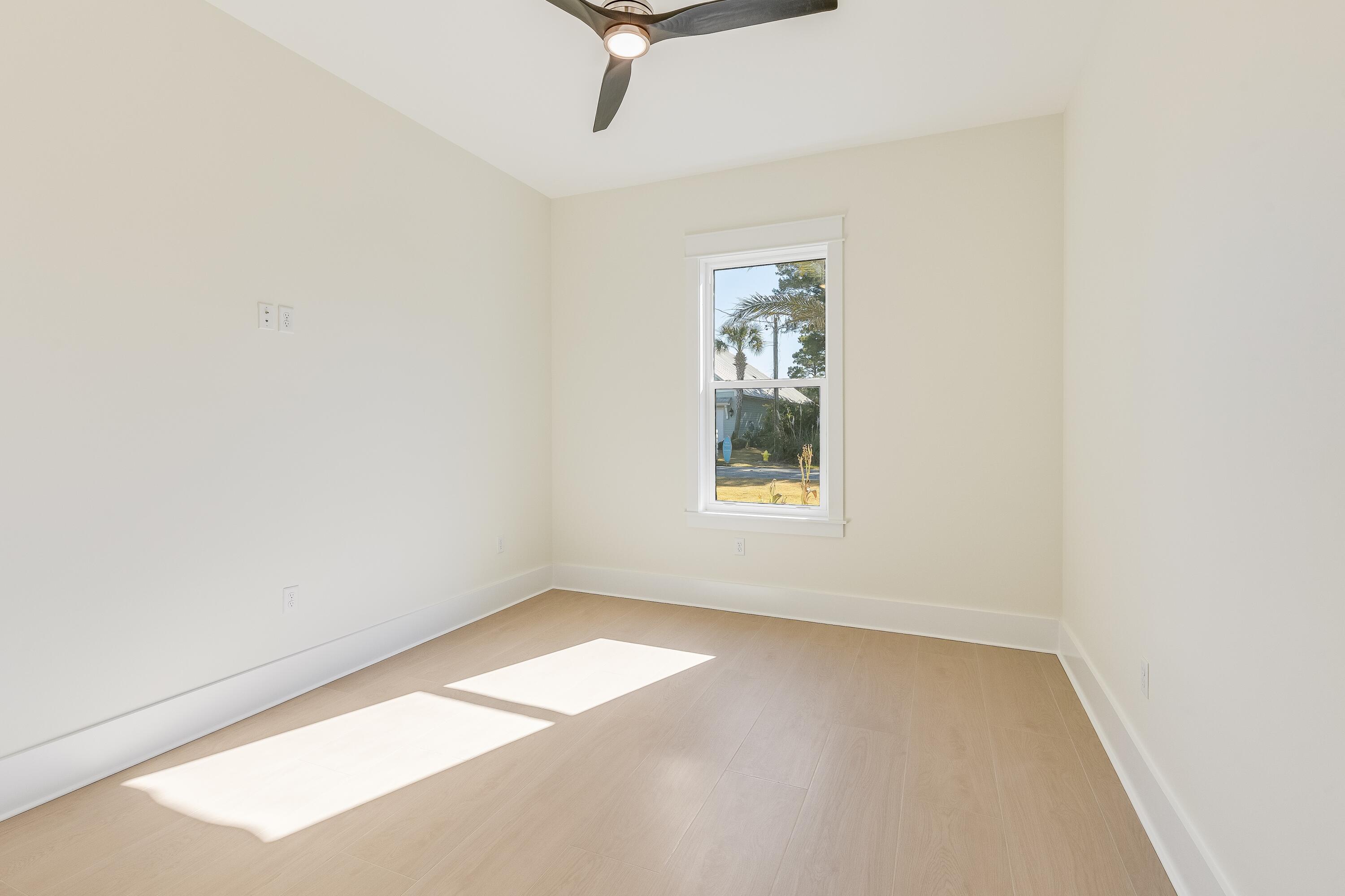 63 Maple Street Santa Rosa Beach, FL 32459 - Photo 9 of 88 an empty room with a window