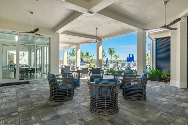 a outdoor dining space with furniture and outdoor view