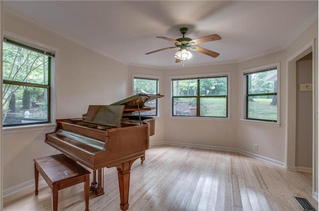 1181 Simms Heights Road Kingston Springs, TN 37082 - Photo 11 of 20 Dining or living room at the front of the house has lots of natural light with wonderful views and is large enough to accommodate a baby grand with comfortable room to spare.