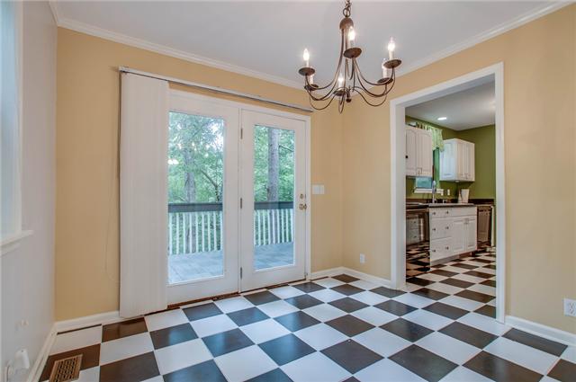 1181 Simms Heights Road Kingston Springs, TN 37082 - Photo 6 of 20 Dining area has treetop views of the hillside.