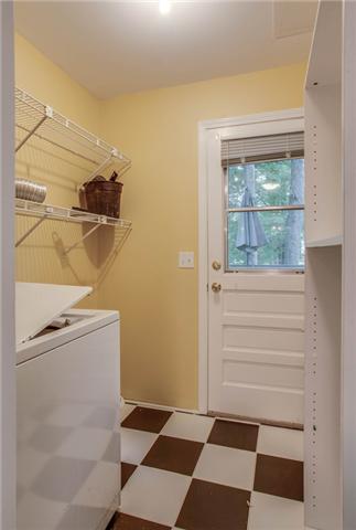 1181 Simms Heights Road Kingston Springs, TN 37082 - Photo 9 of 20 Utility room leading to wrap-around deck.