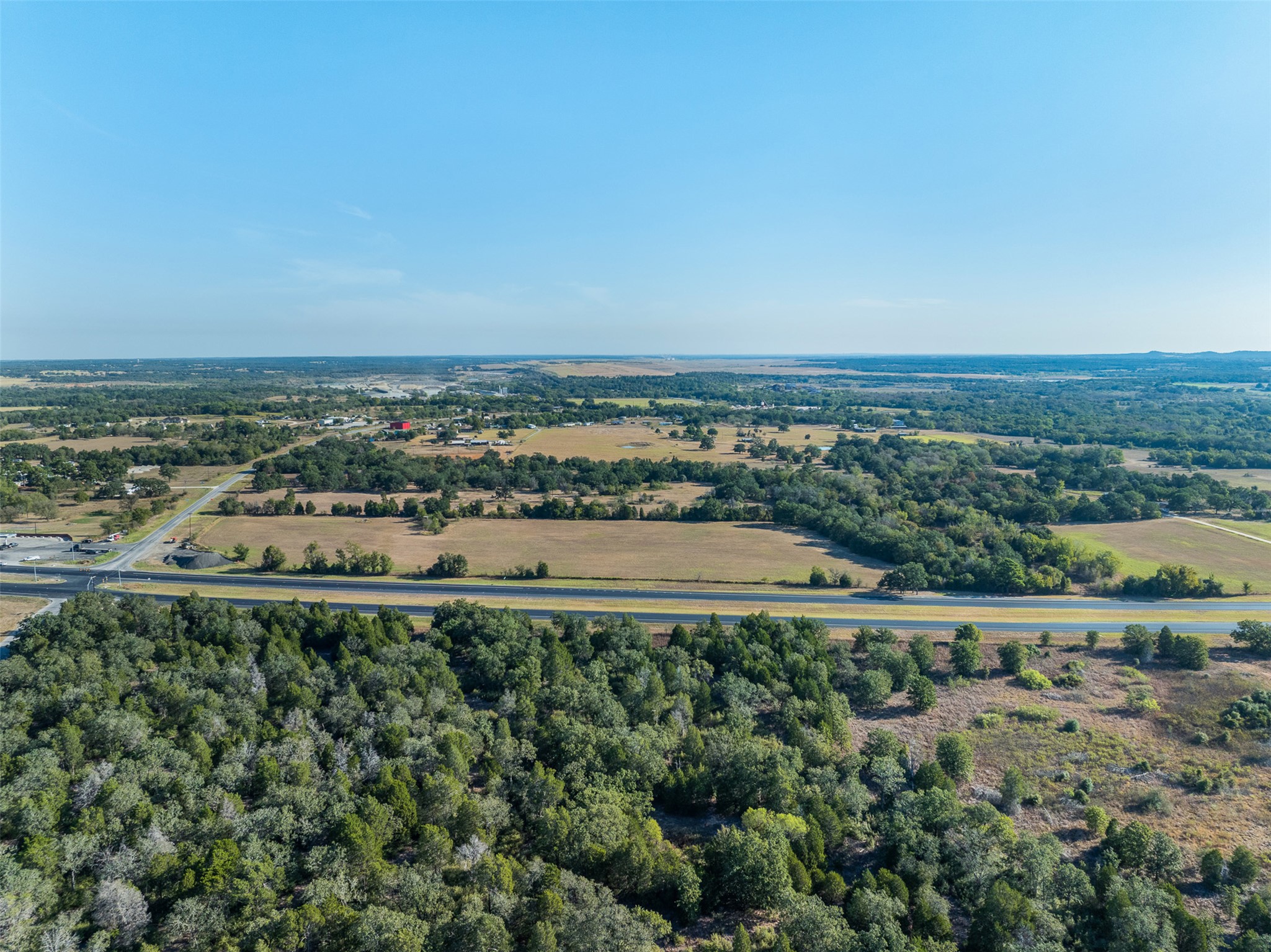 696 Tract 1 Elgin, TX 78621 - Photo 19 of 27 an aerial view of residential building and ocean