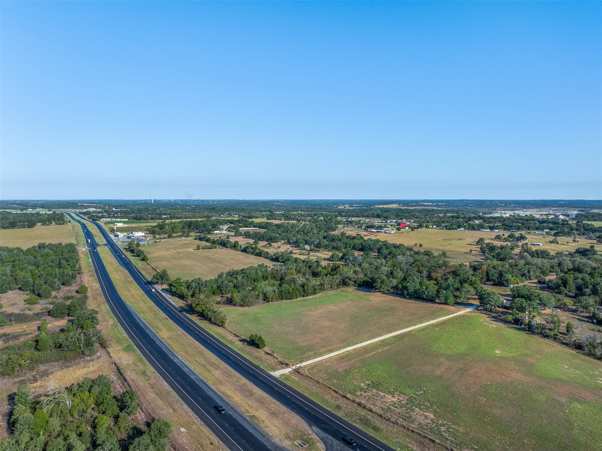 696 Tract 1 Elgin, TX 78621 - Photo 20 of 27 a view of a city from a balcony