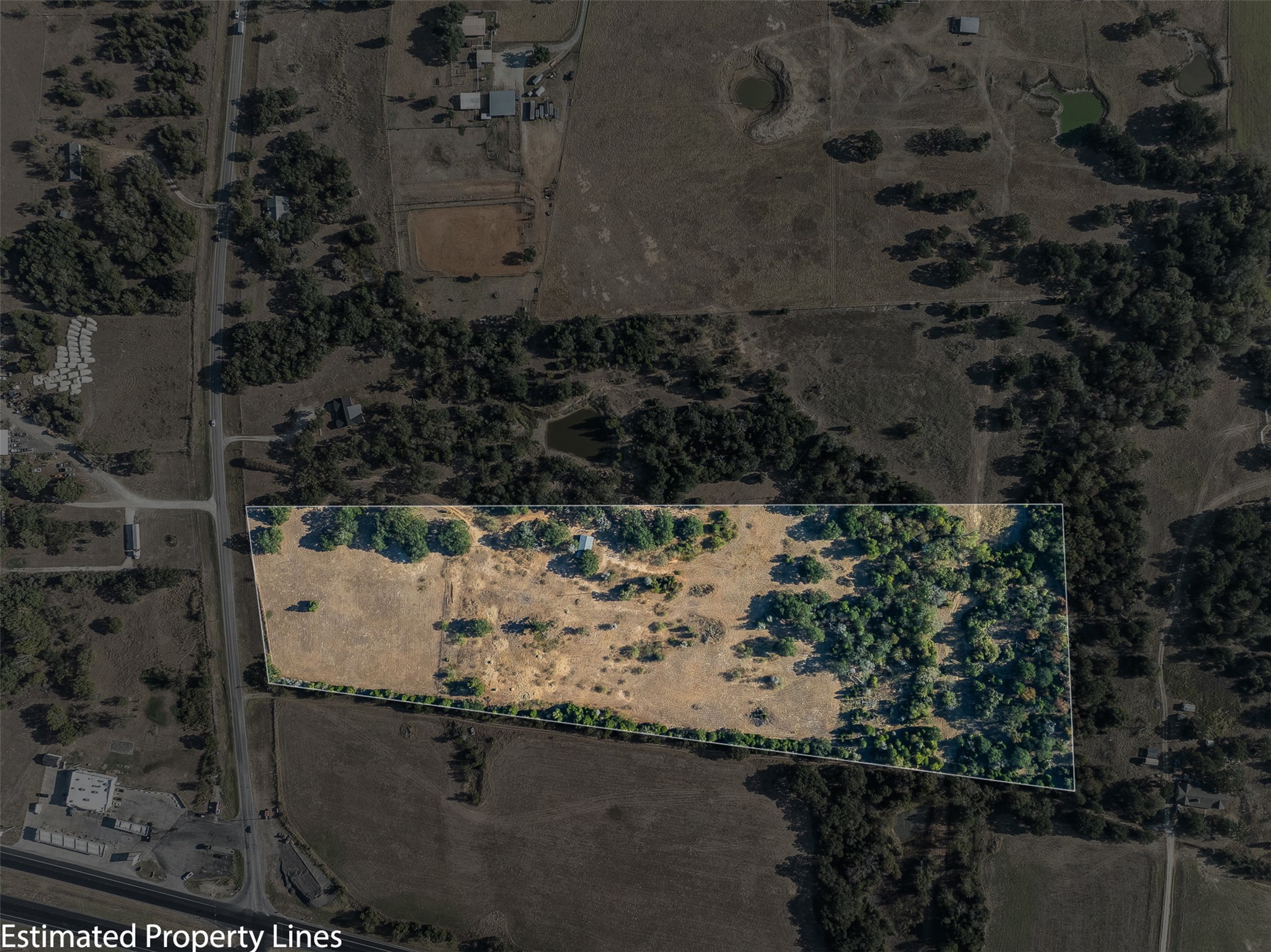 696 Tract 1 Elgin, TX 78621 - Photo 2 of 27 an aerial view of house with yard