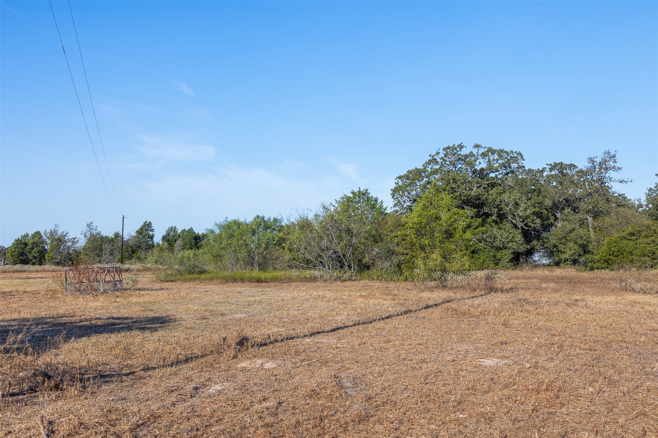 696 Tract 1 Elgin, TX 78621 - Photo 7 of 27 a view of a field with trees in background