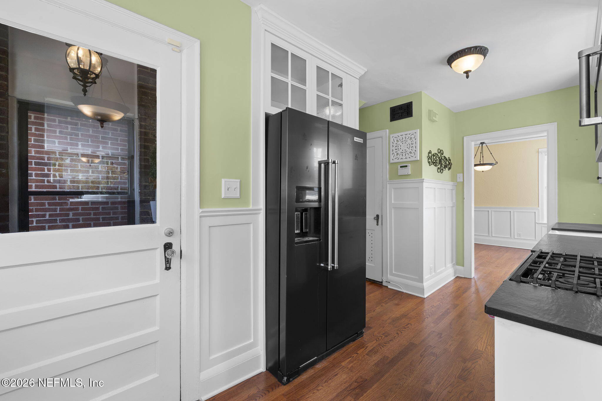 1127 Riviera Street Jacksonville, FL 32207 - Photo 12 of 40 a kitchen with stainless steel appliances granite countertop a refrigerator and a stove