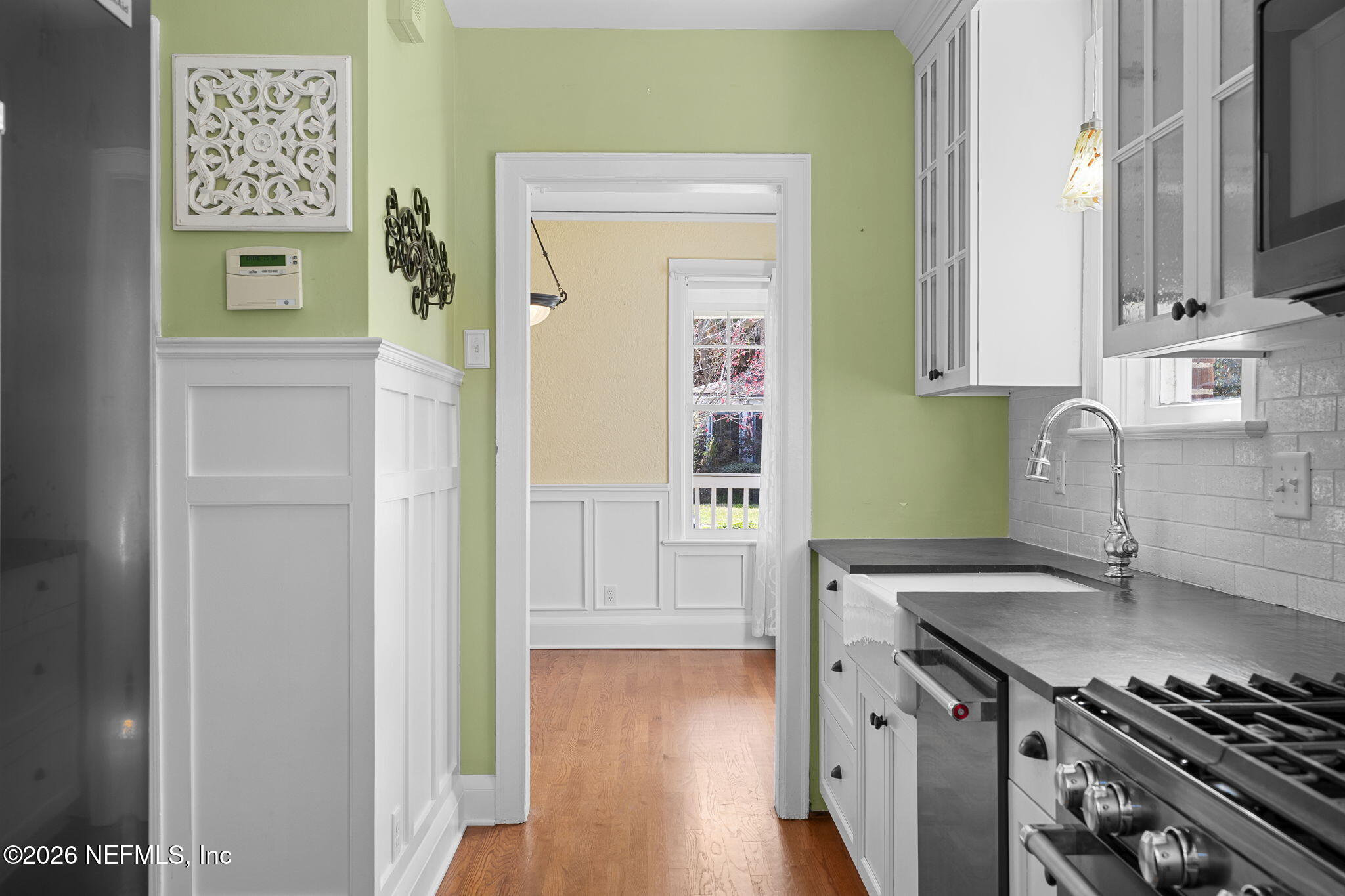 1127 Riviera Street Jacksonville, FL 32207 - Photo 13 of 40 a kitchen with a sink and a stove top oven