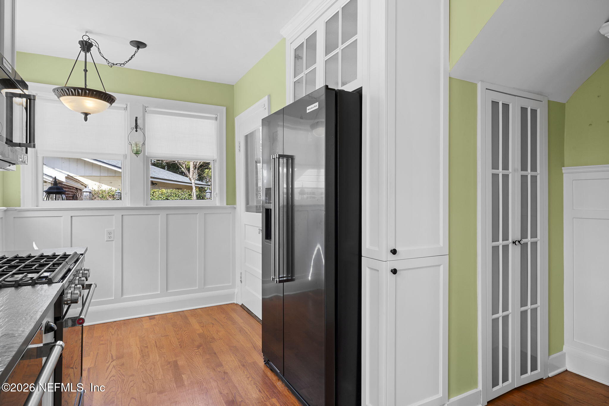 1127 Riviera Street Jacksonville, FL 32207 - Photo 15 of 40 a kitchen with stainless steel appliances granite countertop a refrigerator and a stove top oven